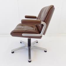 It's best to consider your surroundings when picking the color and design of a desk chair and pick something that will go nicely with the decor. Martin Stoll Brown Leather Office Chair By Karl Dittert 1960s 135650