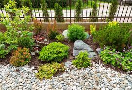 Tips For Keeping Landscaping Rocks From