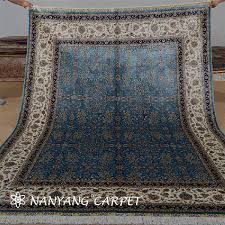 blue green silk persian isfahan rug