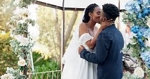 happy black couple wedding and kiss