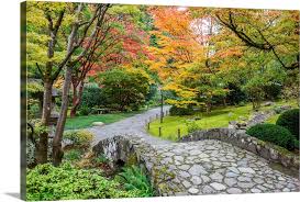 Fall Foliage And Stone Bridge In Lush