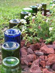 empty wine bottles in the garden