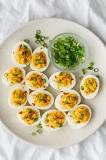 How do you spice up deviled eggs?