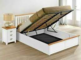 wooden bed with storage s for