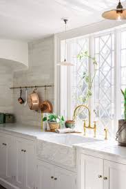 kitchen with these dramatic sinks