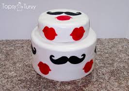 mustache and lips baby shower cake