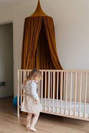 toddler from a cot to a bed