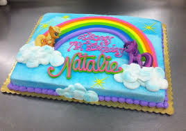 The frosted cake is adorned with all of your favorite gummy bears, gumballs, sour candies, lollipops and more. Unicorn Cakes Unicorn Birthday Sheet Cake