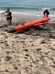20 foot air force drone washes up at
