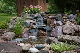 Make this invisible fountain bubbler in an afternoon and enjoy it for years to come! Pondless Waterfall Design Construction Tips For Beginners