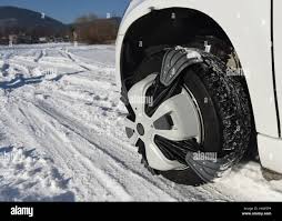 Automatic snow chains (system) from company IPG are mounted on the wheel of  a car Skoda YETI in Vrbno pod Pradedem, Czech Republic, January 30. 2017.  (CTK Photo/Jaroslav Ozana Stock Photo - Alamy