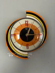 Spinning Meteor Caravan Wall Clock