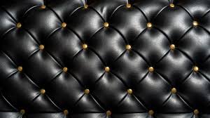Elegant Black Tufted Sofa With Gold