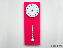 Rotating Numbers Pink Wall Clock