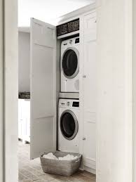 The washer dryer stand does not touch the cabinet, neither do the machines (which is a good thing since they shake quite a bit.) there was even enough room to put in one of the shelves. Laundry Room Organization Ideas Smart Laundry Room Storage For Every Space Real Homes