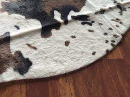 rug print rawhide brown faux cowhide