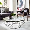 Cheap and affordable glass coffee tables that will give you all the function of a regular coffee table, but appear to take up way less space. 1