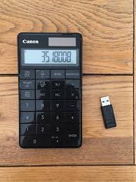 This Calculator Has A Usb Dongle In The Back To Send The