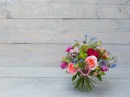 Remove the flowers from their packaging material and sort all the flowers by variety. Make A Hand Tied Bouquet Diy Network Blog Made Remade Diy