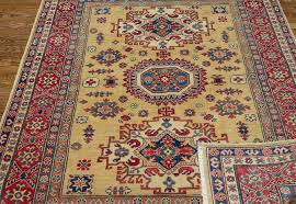 chartreuse oriental rug caucasian motifs