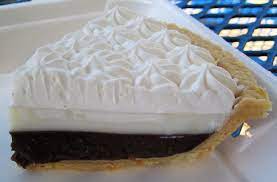 The remaining custard is mixed with chocolate and poured on top. Ono Grinds Chocolate Haupia Pie Recipe Haupia Pie Hawaiian Desserts