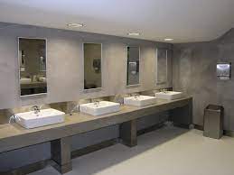 The walls and floor colors are a mix this bathroom design comprises neutral colors, grey and white, contrasted by dark violet and the silver accessories complement the final see more ideas about restroom design, commercial toilet, public bathrooms. Bathroom Restroom Design Commercial Bathroom Designs Commercial Bathroom Ideas