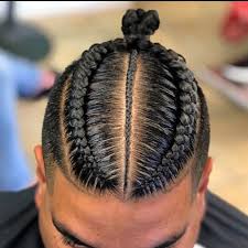 Braids are a great choice for the summer and for vacations. Man Bun Braids A Surprising New Men S Hair Trend To Try