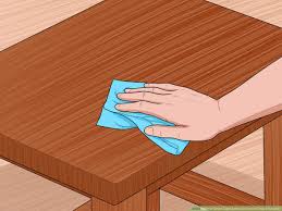 how to clean tape adhesive from wooden