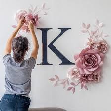 Rose gold emblems with initials and floral decorative for branding logo, corporate identity and wedding monogram design. Wall Paper Flowers Mio Gallery
