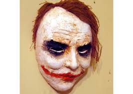 make a joker mask with paper mache clay