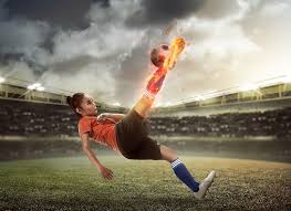 photo football player kick fire ball