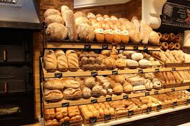 IBA bread display | Bakery display, Bread display, Bakery shop design