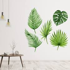 palm tree leaves green plants wall