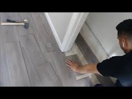 install laminate flooring around doors