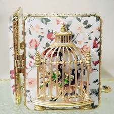 canary cage vine style gold pocket