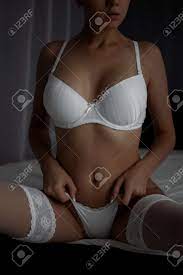 Crop Female Pulling Up Panties Stock Photo, Picture and Royalty Free Image.  Image 116862784.