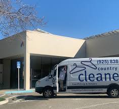 country club cleaners pick up and