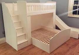 bunk beds with drawer stairs and a