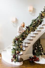 Decorating your banister for christmas creates a festive backdrop for both your holiday and your family christmas card photo. Christmas Garland On Staircase Banister Hgtv