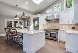 These shaker style cabinets offer a pure white color that's sure to brighten up your cooking corner. White Shaker Kitchen Remodel In Greenwood Village Jm Kitchen Bath