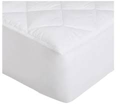 a mattress pad on a foam mattress