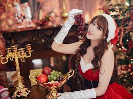Also, here's a collection of 4k christmas wallpapers. Happy Christmas Day Holidays Christmas Girl Beautiful Woman Fruits Hd Wallpaper Wallpaperbetter