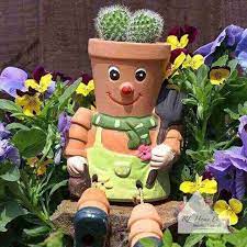 terracotta plant pot man rl home