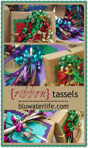 Place the base of your ribbon over the sharp edge of your scissors, then hold your thumb against the ribbon and the flat edge of the blade. Colorful And Easy Ribbon Tassels Using Ordinary Curling Ribbon From Our Christmas Series And How To Christmas Gift Bow Gift Wrapping Bows Bows Diy Ribbon