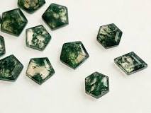 What ore gives moss agate?