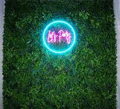 Grass Backdrop And Neon Sign Grass