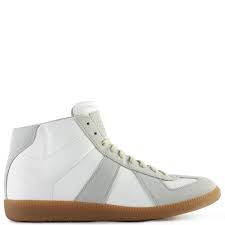 When it comes to high fashion's sneaker offering, regular readers of highsnobiety will know all about our love for maison margiela's output. Maison Margiela Replica High Top Sneakers White Hervia