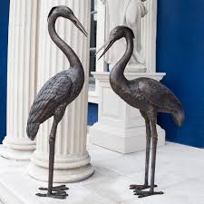 Pair Of Bronze Herons
