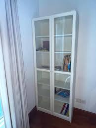 white ikea billy bookcase with gl