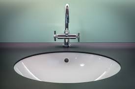 Faucets with this wider spread consist of separate parts that are individually spaced without an escutcheon or base plate joining them. What Are The Standard Faucet Hole Sizes For Kitchens And Bathrooms Faucet Boss
